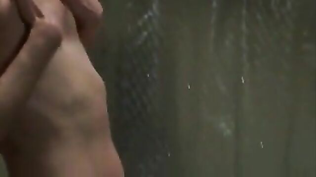 Milla Jovovich gets kissed in the Shower