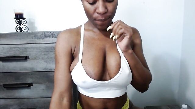 Ebony camgirl shows her big bobs and black nipples