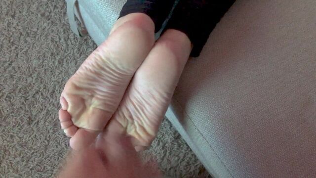 Natalie's soft feet cumshot
