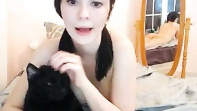 Big eyed girl plays with her fat pussy
