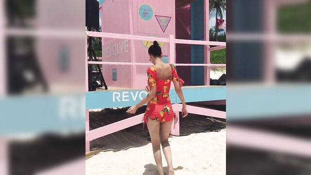 Victoria Justice dancing on the beach