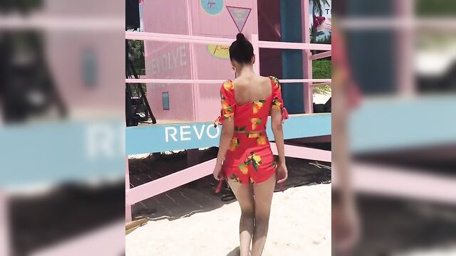 Victoria Justice dancing on the beach