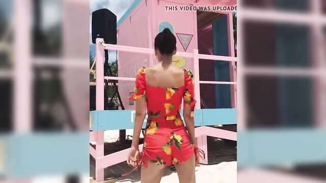 Victoria Justice dancing on the beach