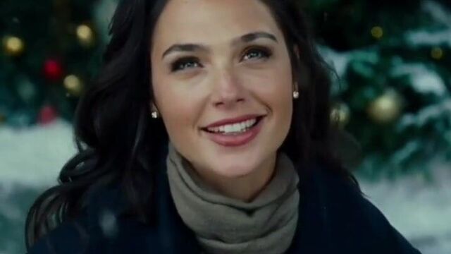 Gal Gadot outside at Christmas time.