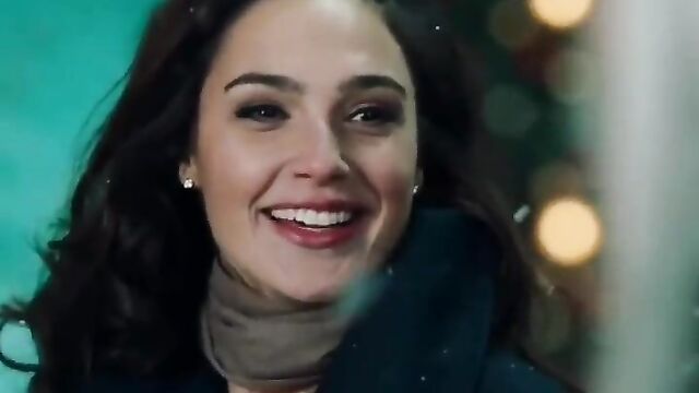 Gal Gadot outside at Christmas time.