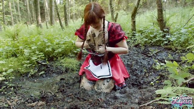 Red Riding hood masturbates in forest mud