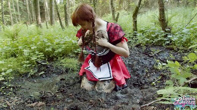 Red Riding hood masturbates in forest mud