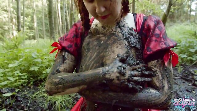 Red Riding hood masturbates in forest mud