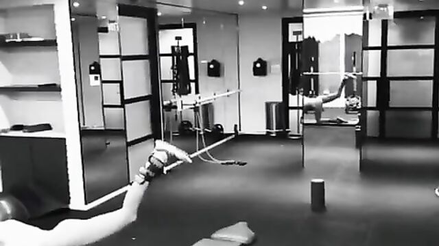 Candice Swanepoel toning her perfect body in the gym