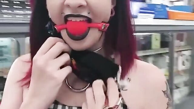 Goth girl gagged in public