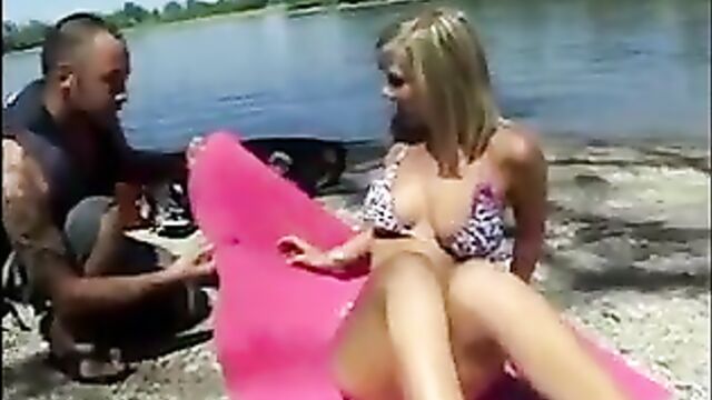 Lucky tattooed wakeboarder fucks this hot blonde skank's pussy on the beach