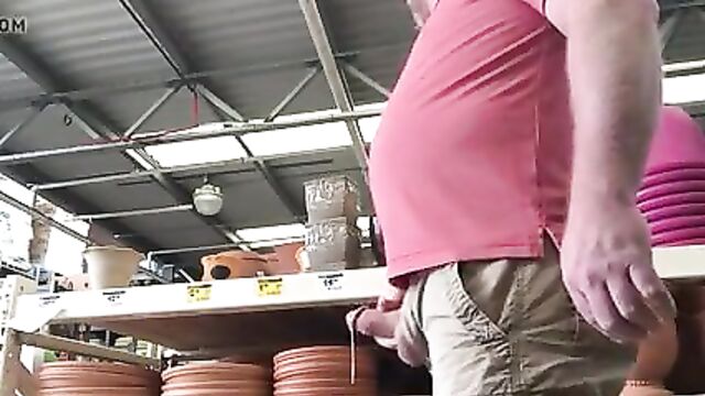 Bear public cum in a hardware store