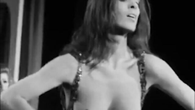 Energetic topless go-go dancer, vintage 60s