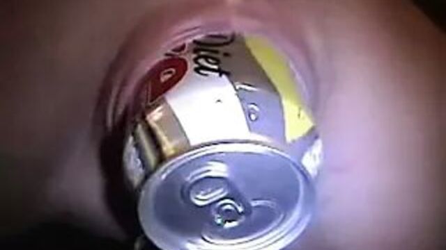 Stretched pierced pussy with coke can in it Body piercings