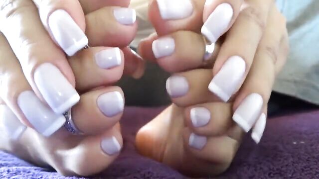 beauty woman show her Hands and feet in French nails style