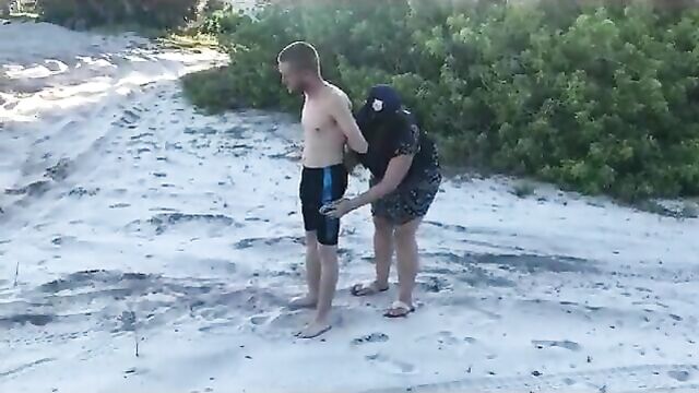 Policewoman Makes Man Strip Naked at a Public Beach – ENM CFNM
