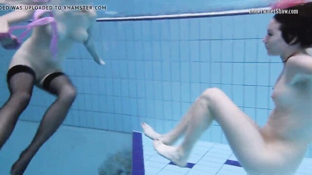 Andrejka and Aneta swim naked in the swimming pool