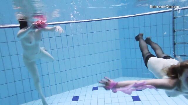 Andrejka and Aneta swim naked in the swimming pool