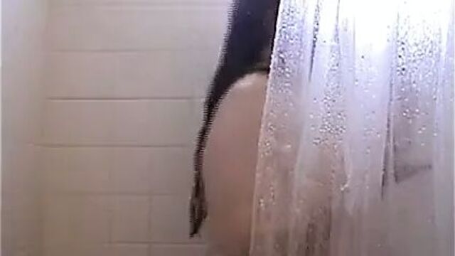 Mystery BBW with huge tits in the shower