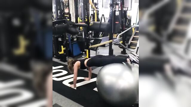 Kate Beckinsale working out with a big ball