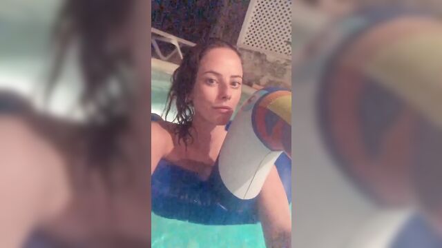 Kaya Scodelario in a pool, selfie vid.