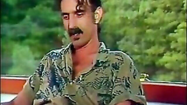 Frank Zappa having distraction during an interview
