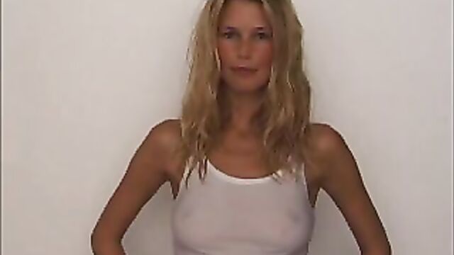 Claudia Schiffer showing nipples in a see-through shirt