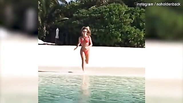 Amanda Holden running in bikini Baywatch style