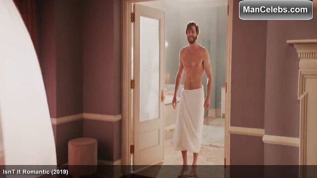 Liam Hemsworth strips naked and wraps a towel around his wai