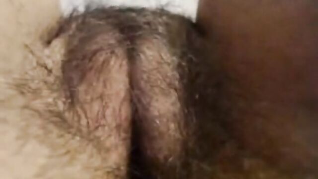 Mature hairy genital slit, close up