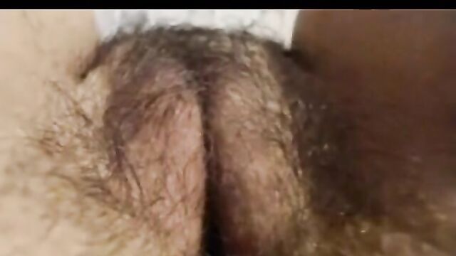 Mature hairy genital slit, close up