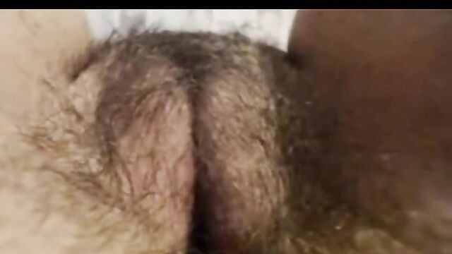 Mature hairy genital slit, close up