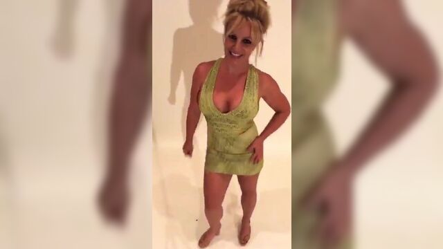 Britney Spears cleavage in green outfit