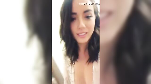 Chloe Bennet cleavage in dress