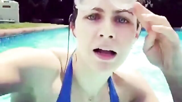 Alexandra Daddario in a pool - August 2018
