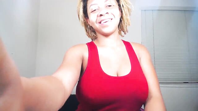 Ebony flashing big boobs on cam
