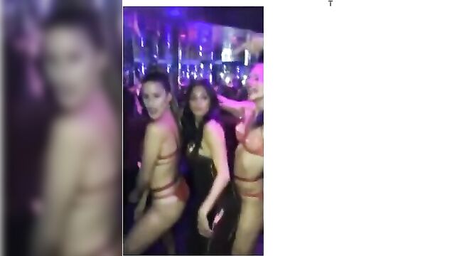 Nicole Scherzinger dancing with hot babes in a club