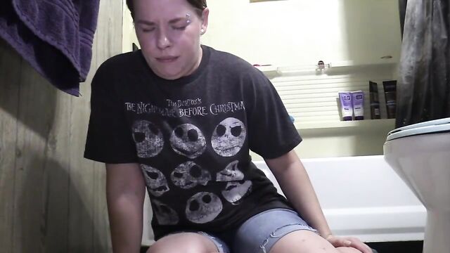 Chubby girl farting on the bathroom floor