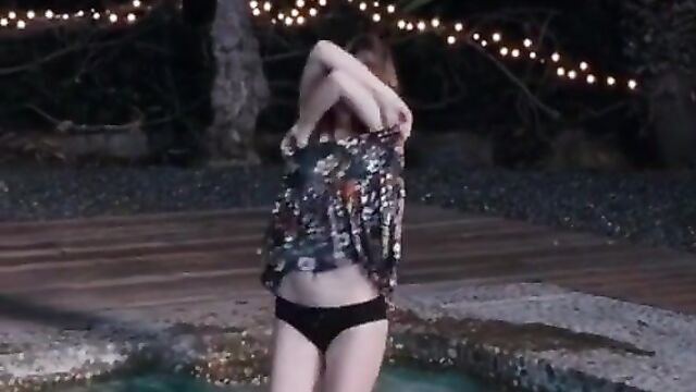 Anna Kendrick in her bra and panties getting into pool