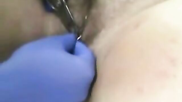 Getting her pussy pierced with extra rings Body piercings