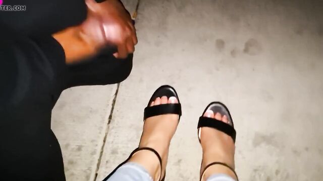 Black pervert cumming on sexy feet in black sandal in public