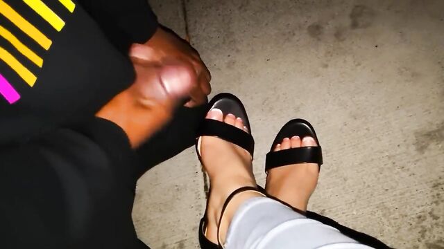 Black pervert cumming on sexy feet in black sandal in public