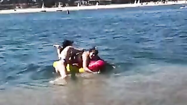 Noah Cyrus and fat friend at the beach