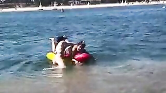 Noah Cyrus and fat friend at the beach