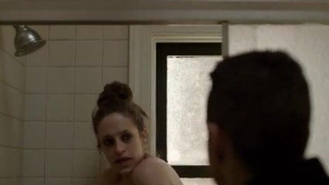 Carly Chaikin takes a shower