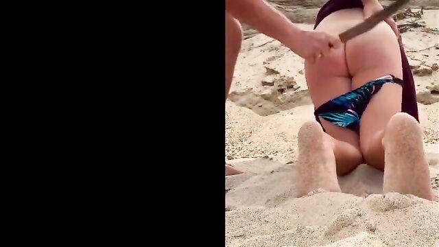 Beach bum spanking