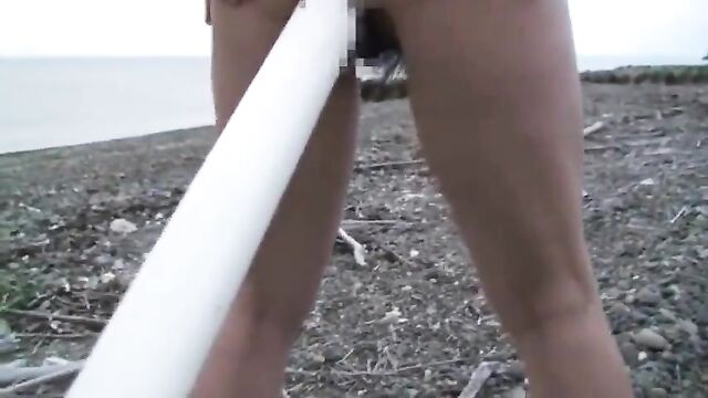 Weird Anal Insertion at the Beach