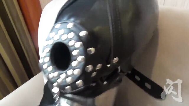 Latex bondage gasmask play