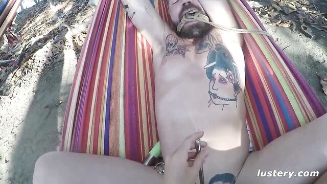 Kinky Couple Fucks Outdoors on Hammock