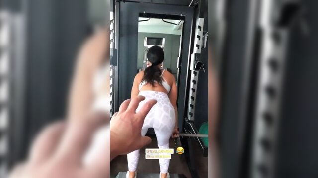 Tenille Dashwood lifting weight, showing off her perfect ass